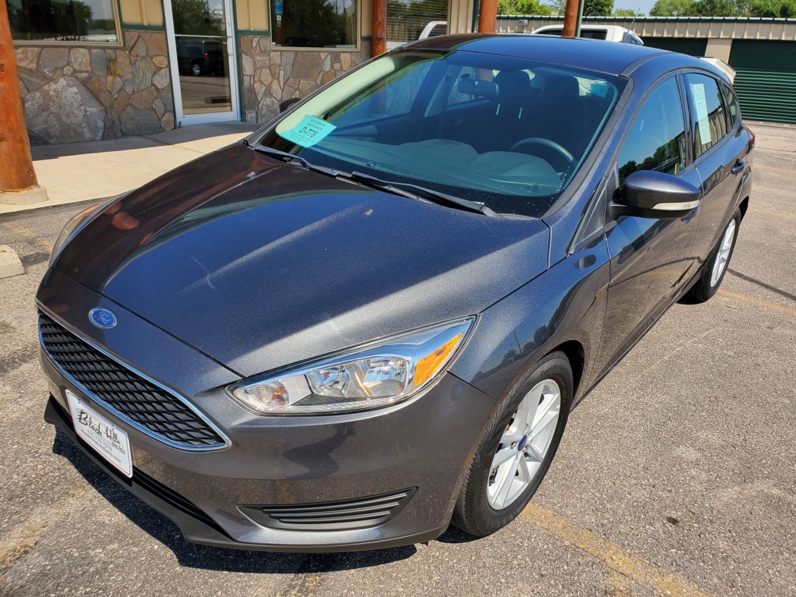 2016 Tan /Black Ford Focus SE (1FADP3F23GL) with an 2.0L 4Cyl GDI TI-VCT engine, 6-Speed Powershift Automatic transmission, located at 1600 E Hwy 44, Rapid City, SD, 57703, (605) 716-7878, 44.070232, -103.171410 - Photo #30